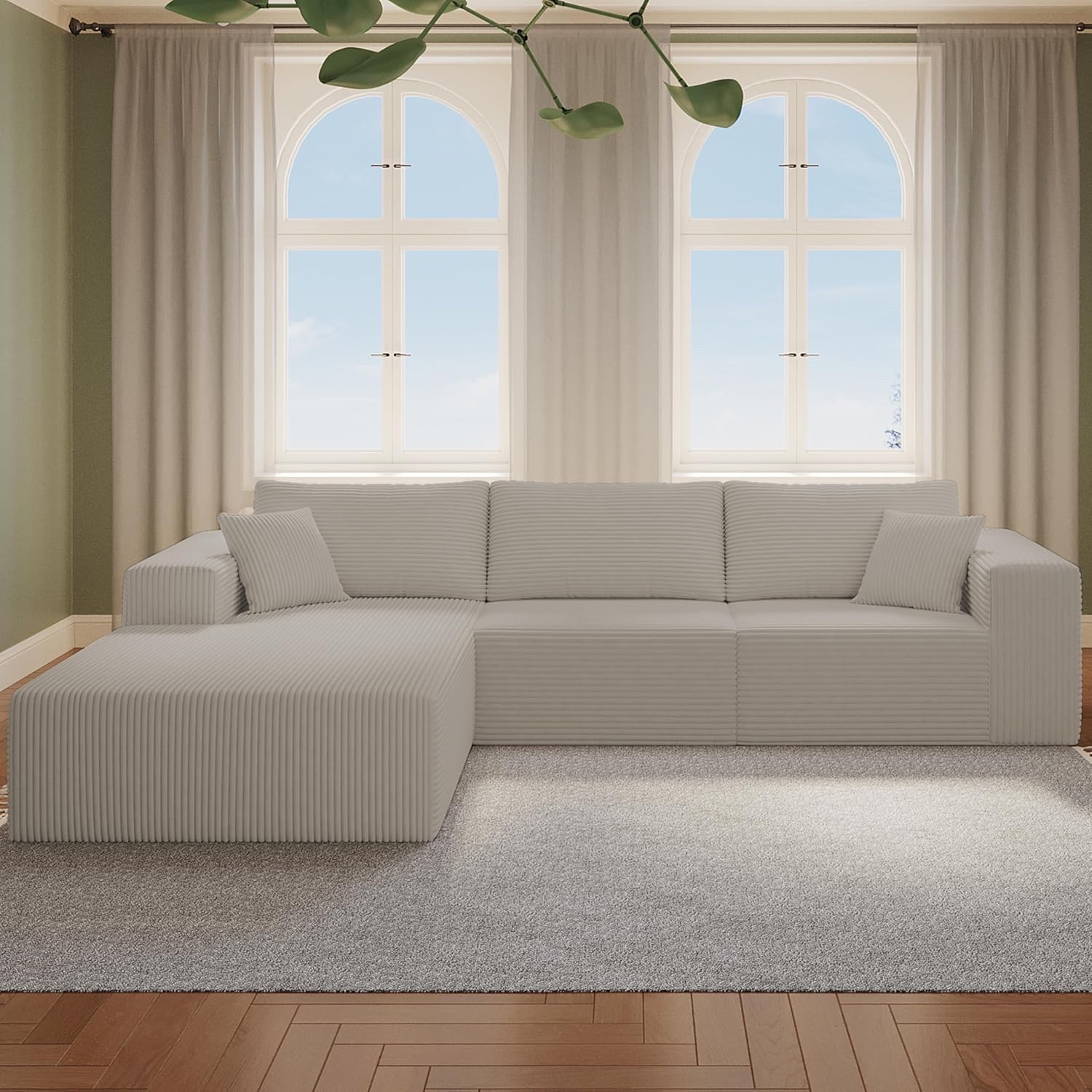 Cloud sofa in a living room in an L-shape layout.